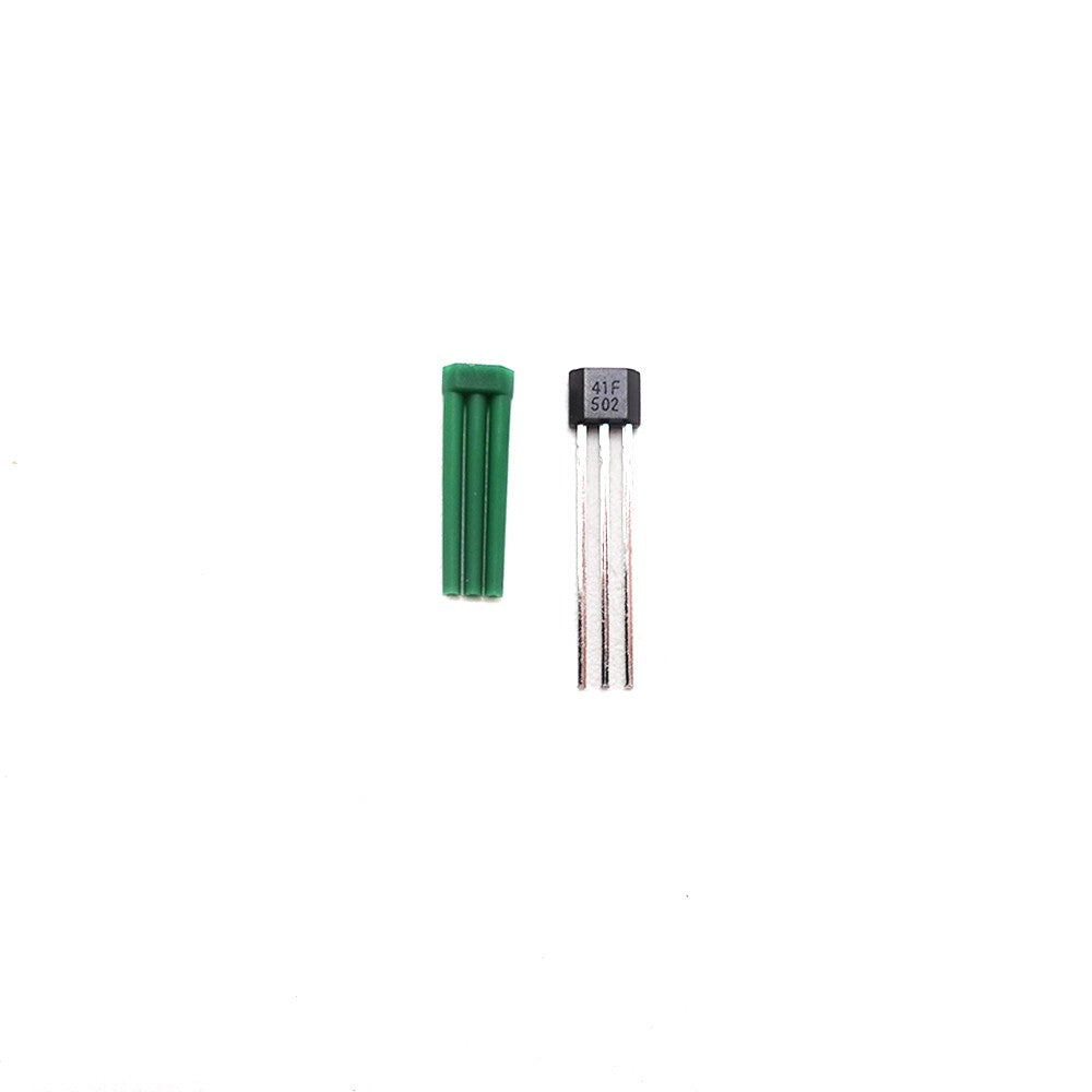 Capteur à effet Hall 41F à 3 broches avec son support vert sur fond blanc