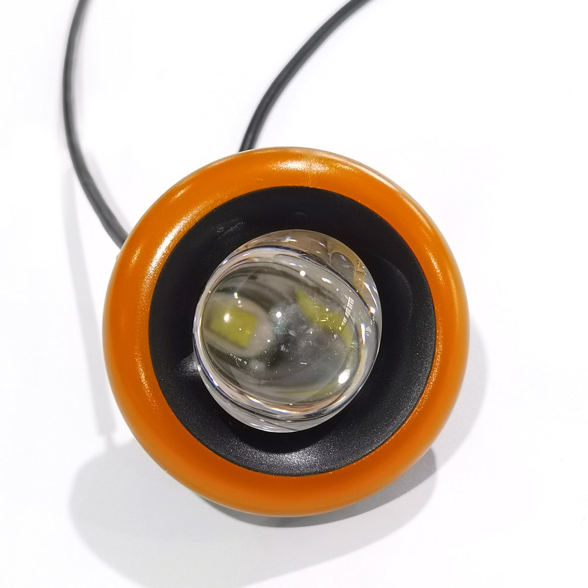 Phare avant droit de deck rond avec cerclage orange de Dualtron X Limited vu de face