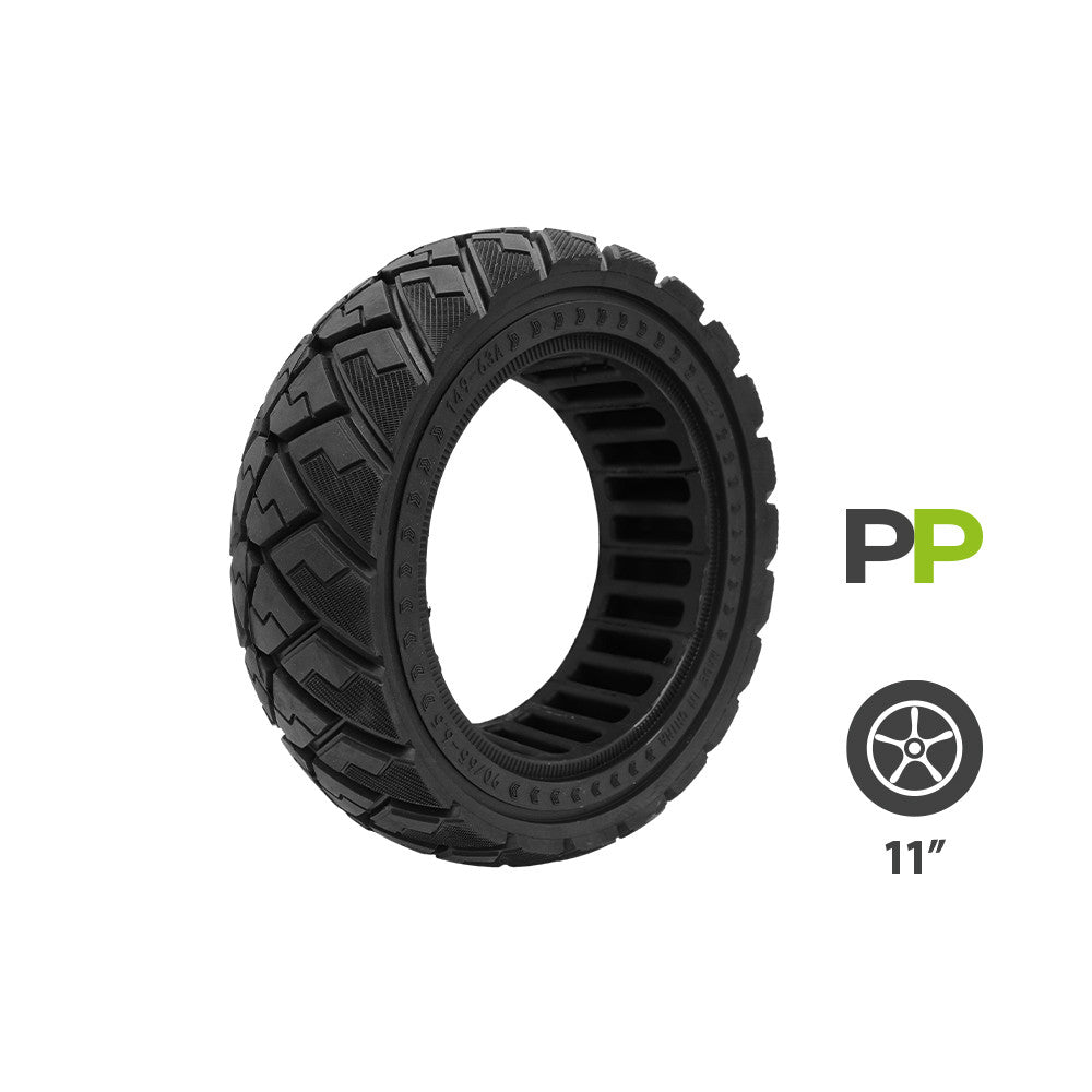 Pneu plein noir alvéolé 90/65-6.5 pour trottinette électrique vu de trois quarts