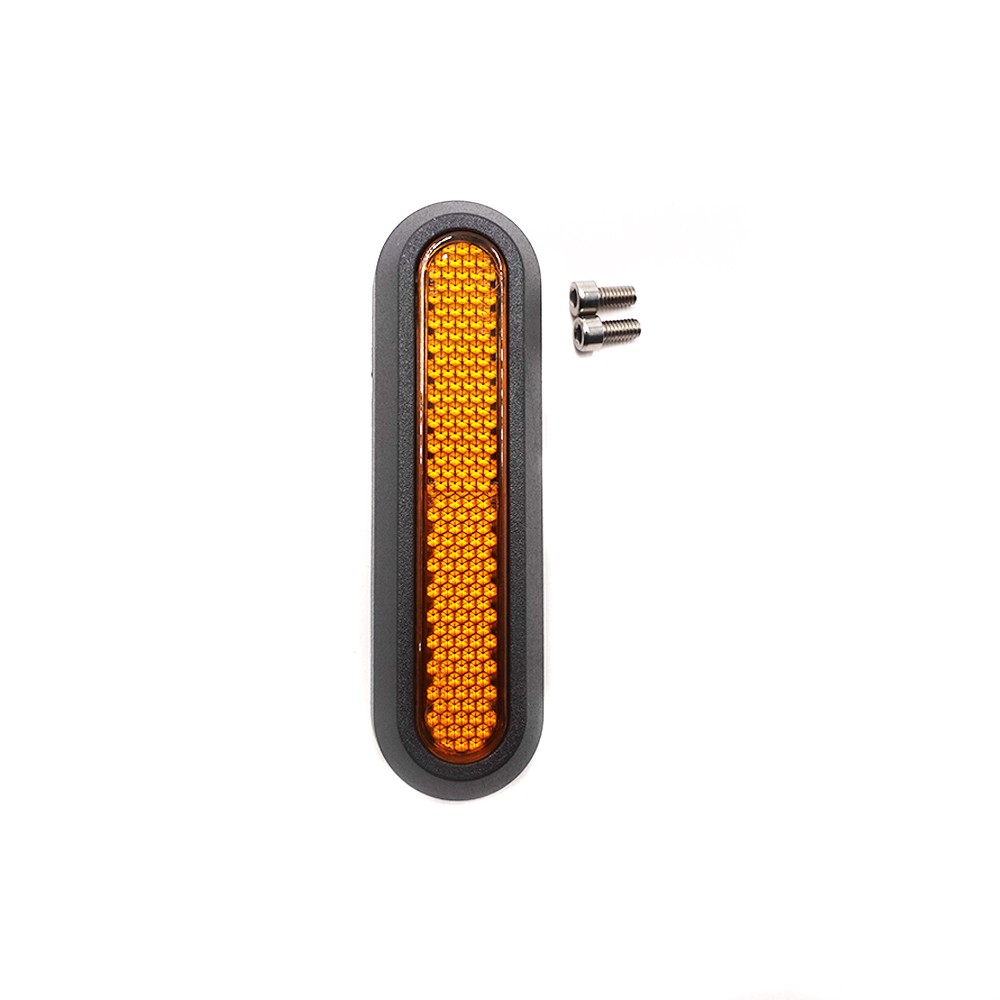 Cache vis en plastique noir avec réflecteur orange et deux vis de fixation.