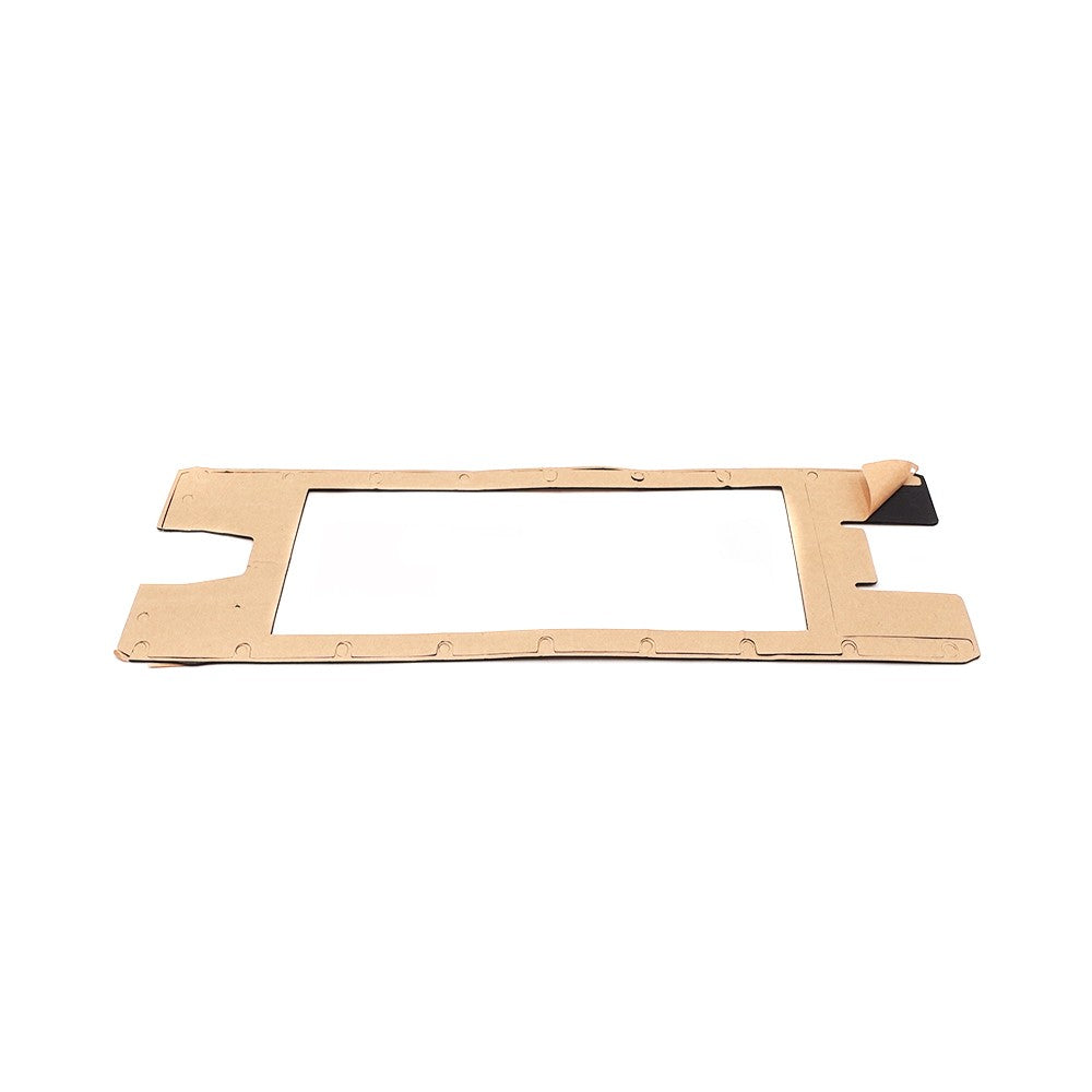 Joint de deck en silicone noir recouvert d'un papier protecteur marron posé à plat