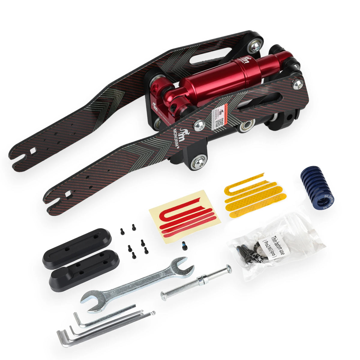 Kit de suspension avant Monorim V5 rouge et effet carbone avec ses accessoires de montage
