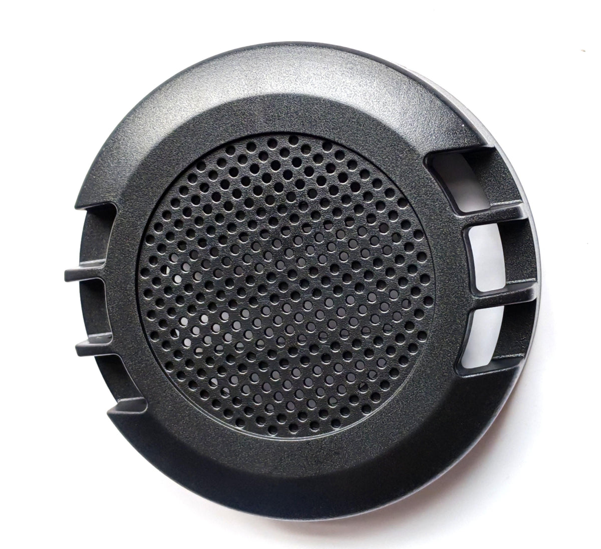 Boîtier de klaxon rond en plastique noir perforé vu de face