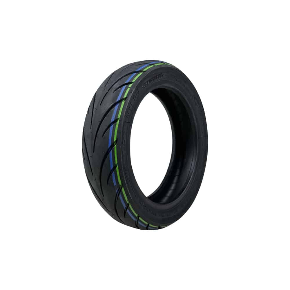Pneu tubeless noir 10x2.30-6.5 avec liserés bleu et vert vu de trois quarts